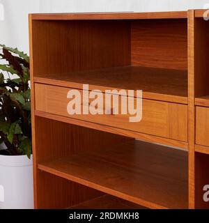 Vintage teak media console. Mid-Century Modern record storage cabinet. Stock Photo