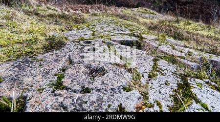 Ormaig cup and ring marks, neolithic rock art, near Kilmartin, Argyll, Scotland Stock Photo