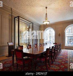 Conference room with display case. York Mansion House, York, United Kingdom. Architect: De Matos Ryan, 2018. Stock Photo