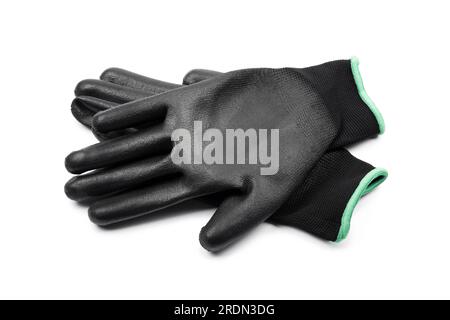 Black textile work gloves with rubber isolated on white Stock Photo