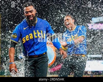 Seattle Mariners Teoscar Hernandez swings through while batting against the  Colorado Rockies during the third inning of a baseball game, Friday, April  14, 2023, in Seattle. (AP Photo/John Froschauer Stock Photo - Alamy