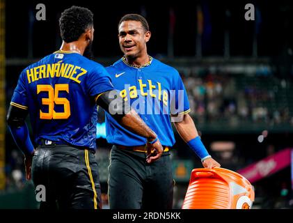 Seattle Mariners Teoscar Hernandez swings through while batting against the  Colorado Rockies during the third inning of a baseball game, Friday, April  14, 2023, in Seattle. (AP Photo/John Froschauer Stock Photo - Alamy