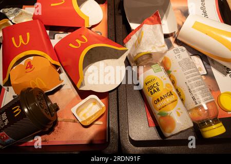 Garbage after eating McDonald's food, paper and plastic recyclable and non-recyclable packaging. May 17, 2023, Vienna, Austria Stock Photo
