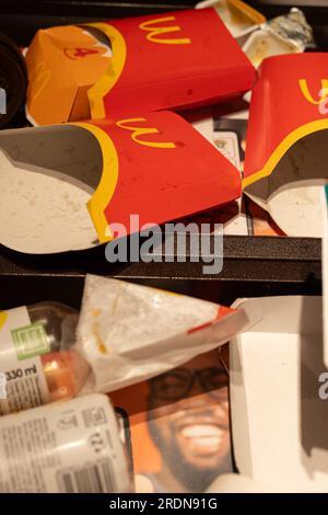 Garbage after eating McDonald's food, paper and plastic recyclable and non-recyclable packaging. May 17, 2023, Vienna, Austria Stock Photo