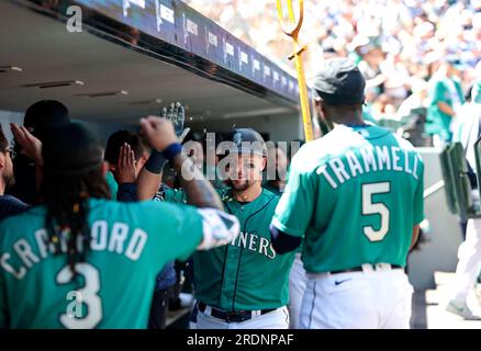 Cal Raleigh of the Seattle Mariners is congratulated by teammates