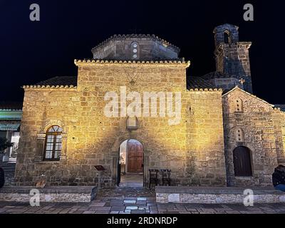 KALAMATA - GREECE, JANUARY 2022: The Historical Byzantine church Agioi Apostoloi (The Holy Apostles) built in 13th century with the brick enclosed mas Stock Photo