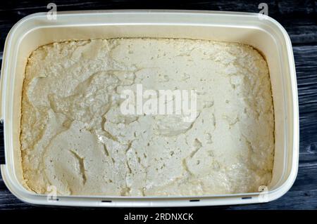 Traditional plain tahini halva or Halawa Tahiniya, the primary ingredients in this confection are sesame butter or paste (tahini), and sugar, glucose Stock Photo