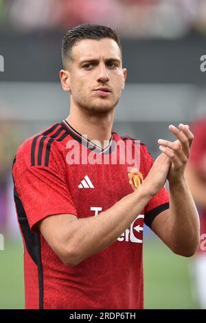 Manchester United defender Diogo Dalot (20) and Manchester United Manager Ruben Amorim during ...