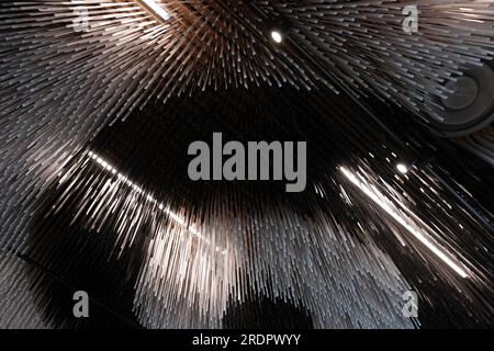 Ceiling  with illuminated plastic strips hanging down in the Vabamu Museum of Occupations and Freedom, Tallinn, Estonia Stock Photo