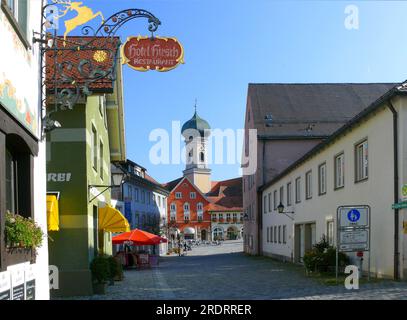 Immenstadt im Allgaeu, old town with pedestrian zone and Hotel Deer, St. Nicholas Parish Church Stock Photo