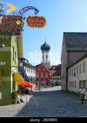 Immenstadt im Allgaeu, old town with pedestrian zone and Hotel Deer, St. Nicholas Parish Church Stock Photo