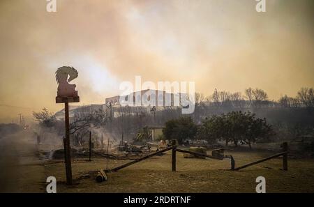 Rhodes Island. 22nd July, 2023. This photo taken on July 22, 2023 shows smoke caused by a massive wildfire in the Rhodes island in Greece. At least 2,000 residents and holidaymakers were evacuated by sea in the fire-stricken areas of Rhodes island in Greece on Saturday evening, authorities said. Credit: Argiris Mantikos/Xinhua/Alamy Live News Stock Photo