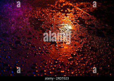 Abstract wet surface with red and blue lights Stock Photo