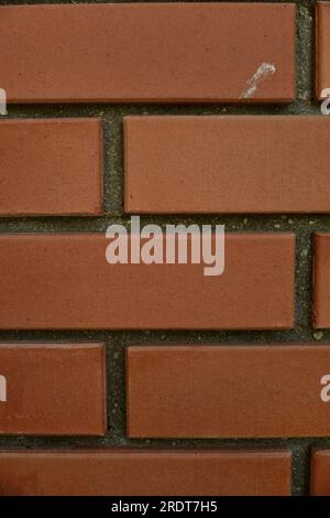 Red brick and brick edge from pillar in front of wall as texture background Stock Photo