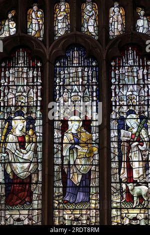 St. Olave's Church, York: the timeless beauty of Shrigley & Hunt's vibrant 20th-century stained glass windows in North Yorkshire, UK. Stock Photo