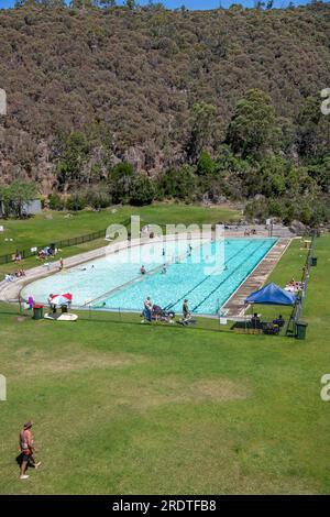 Large public swimming pool hot summers day Cataract Gorge Launceston Tasmania Australia 1 Stock Photo