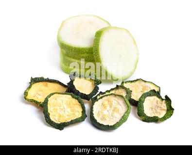 Dried zucchini slices isolated on white background. Stock Photo