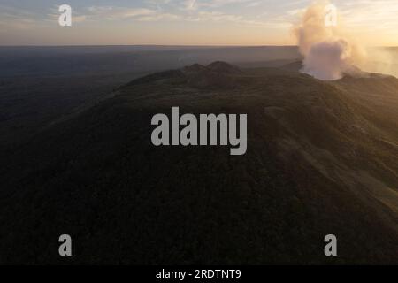 Hike in volcanic landscape theme. Active Masaya volcano aerial drone view Stock Photo