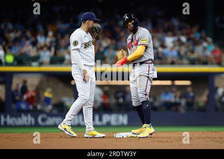 Milwaukee Brewers' Willy Adames, right, celebrates after his base hit  during the eighth inning of a baseball game against the Toronto Blue Jays,  Sunday, June 26, 2022, in Milwaukee. (AP Photo/Kenny Yoo