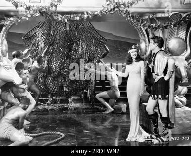 CLAUDETTE COLBERT as Cleopatra and HENRY WILCOXON as Marc Antony in CLEOPATRA 1934 director CECIL B. DeMILLE Miss Colbert's costumes Travis Banton Paramount Pictures Stock Photo