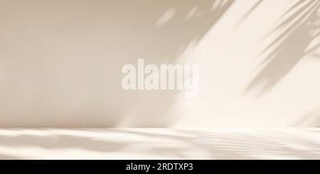 plant leaf shadows on beige wall. background for product advertisement. banner with copy space Stock Photo