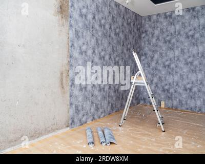 One room has been partially renovated. copy space. Pasting paper ...