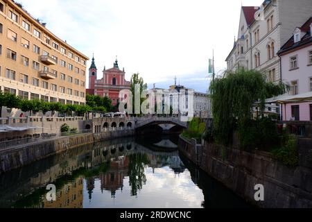 View of Franciscan Church of the Annunciation from the Ljubljanica River Stock Photo