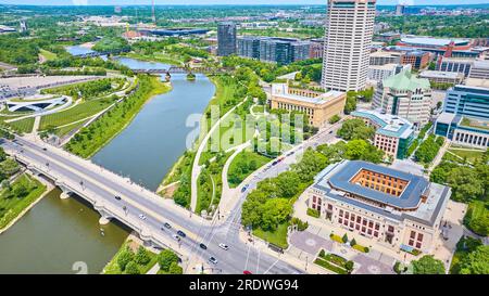 Aerial sky view of river leading out of Columbus Ohio and bridge leading into city Stock Photo