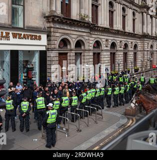 23rd July 2023 - Police kettling a group of protesters in St Vincent Place in Glasgow City Centre, Scotland, UK Stock Photo