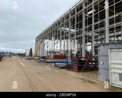 Construction industry concrete plant structure on a clear blue sky. Stock Photo