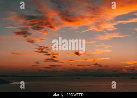 Real amazing panoramic sunrise or sunset sky with gentle colorful clouds. Long panorama Stock Photo