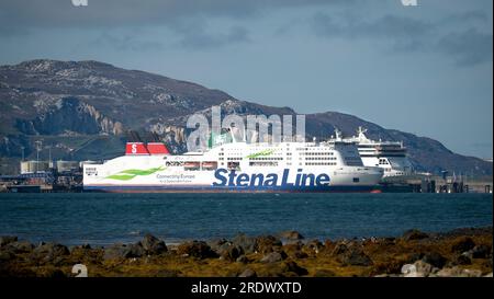 Irish Sea Ferries (Stena Adventurer and the Ulysses) at Holyhead Port. (Holyhead Mountain in the background) Stock Photo