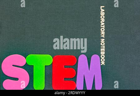 STEM in bright letters highlights Science Technology Engineering and Mathematics in education, schools, and learning Stock Photo