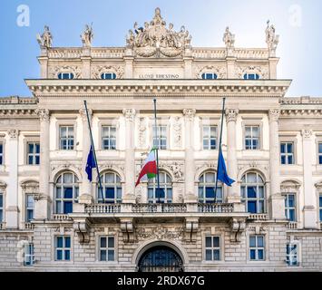 Façade of Lloyd Triestino Palace, built in 19th century in piazza Unità d'Italia,  today house of the regional government, Trieste city center, Italy Stock Photo