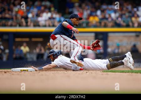 July 23, 2023: Milwaukee Brewers second baseman Owen Miller (6) beats the  tag by Atlanta Braves shortstop Orlando Arcia (11) for a stolen base during  the game between the Milwaukee Brewers and