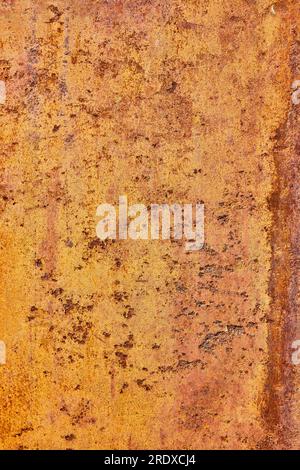 Abstract orange metal rusting background asset, brown flaking paint Stock Photo