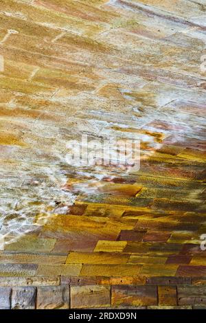 Curved arch of old stone bridge vertical background asset Stock Photo