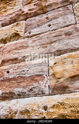 Vertical wall of rustic gold and yellow bricks background asset Stock Photo
