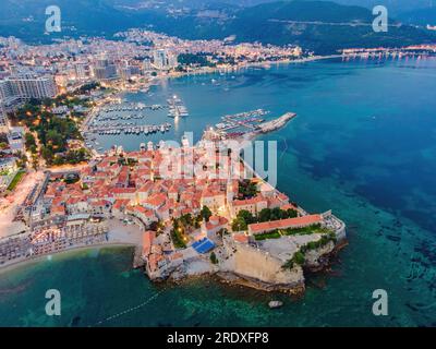 Budva city lights from Montenegro seen from above. Night view. Drone old town Budva at night Stock Photo
