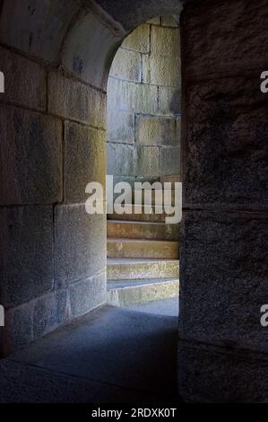 A pinched view of circular stone steps that lead to the Long Alley at Fort Knox, Maine's largest historic fort, near Prospect, Maine. Stock Photo