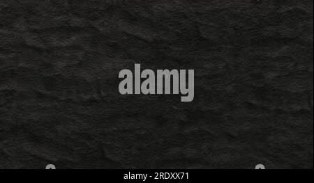 rough sandy black plaster on the wall for background Stock Photo