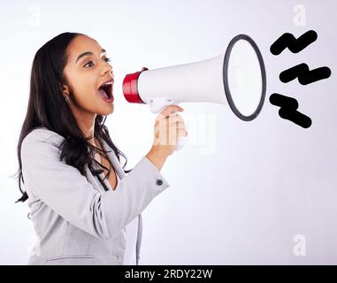 Business woman, megaphone or announcement in studio, white background and freedom of speech, loud noise and breaking news. Female worker shouting with Stock Photo