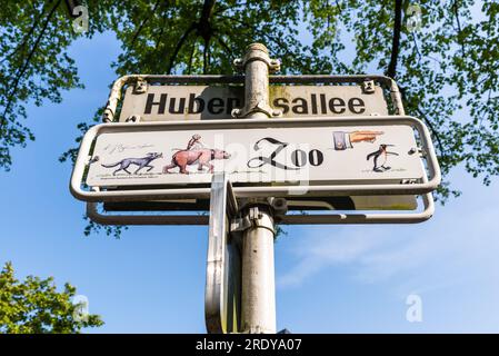 Wuppertal, Germany - May 3, 2022: Signpost and street sign to Wuppertal Zoo in North Rhine-Westphalia, Germany. Stock Photo