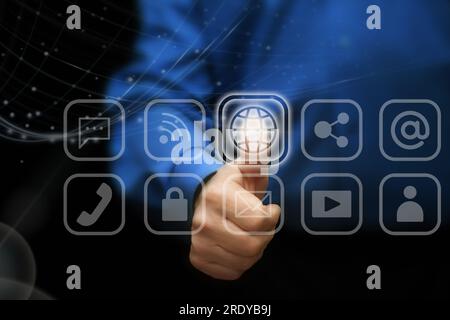 Man touches the icons (hologramms) of cloud technology data storage, network, wi-fi, mobile internet, social networks, emails, cloud storage, multimed Stock Photo