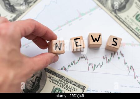 News symbol. Concept word News on wooden cubes. Beautiful white background. Business and News concept. Copy space. Conceptual image Stock Photo