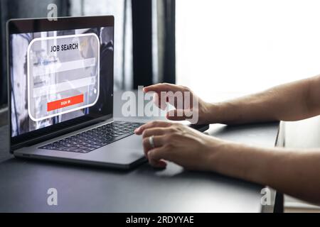 Man working on laptop and Information for the searching job, employment concept. Stock Photo