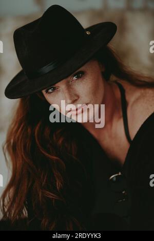 Redheaded Woman with Hat Stock Photo