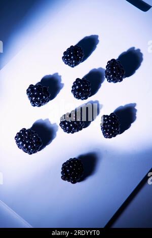 Top view on blackberries lying on cutting board Stock Photo