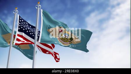 Two Delaware state flags waving with the National flag of the United States in the middle on a clear day. 3d illustration render. Fluttering fabric. S Stock Photo