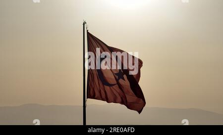 Aerial view of waving turkish flag in reverse light. High quality photo Stock Photo